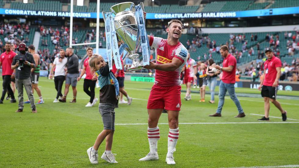 Danny Care lifts the Premiership trophy