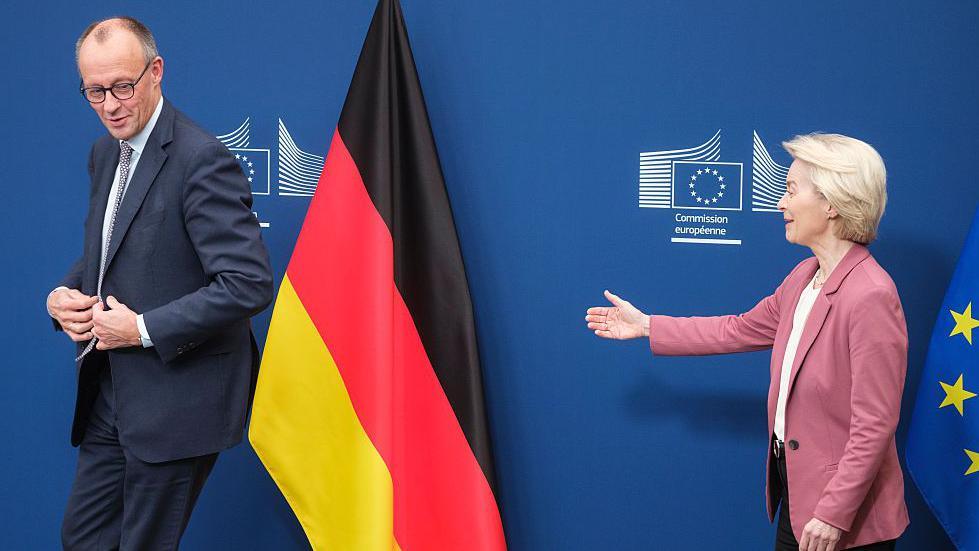 German Chancellor Friedrich Merz (L) is welcomed by the President of the European Commission, Ursula von der Leyen (R)