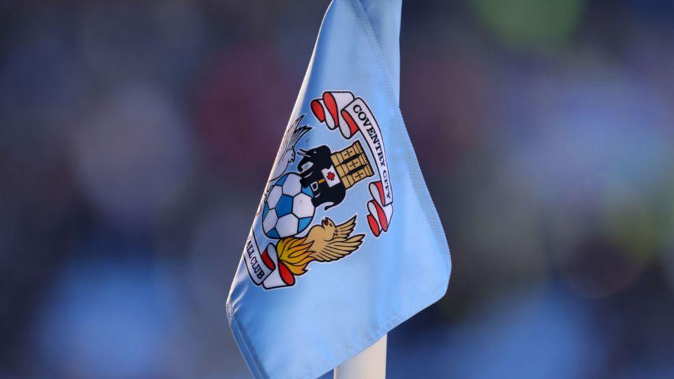 Coventry City crest on a corner flag
