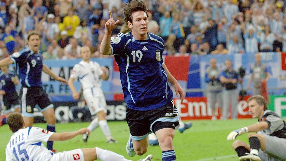 Argentinian forward Lionel Messi celebrates after scoring as Serbia and Montenegro's goalkeeper Dragoslav Jevric (R) and Serbia and Montenegro's defender Milan Dudic (15) react during the World Cup in 2006 