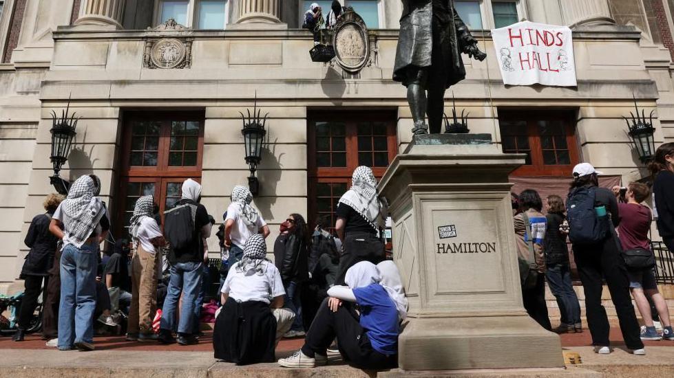 Student protesters move supplies from outside Hamilton Hall, where students at Columbia University barricaded themselves to protest in support of Palestinians