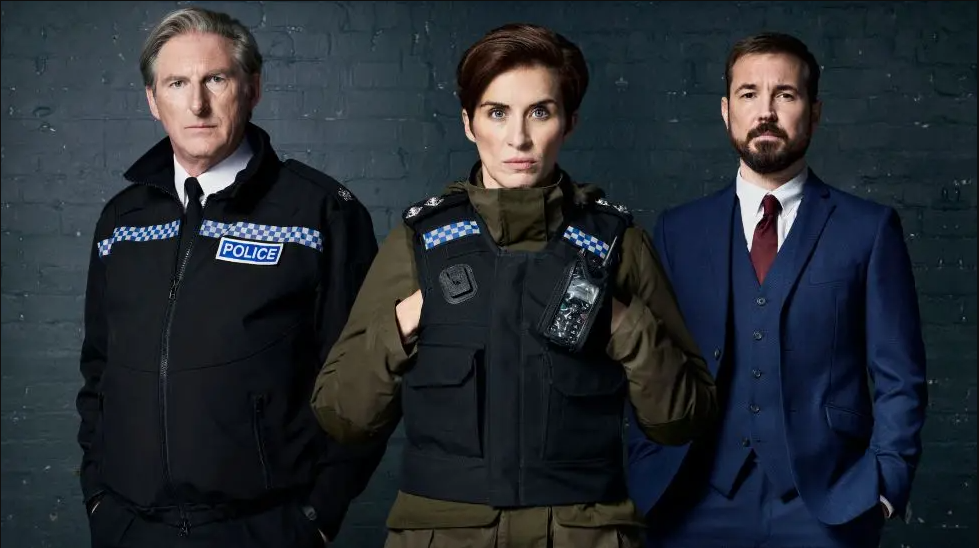 The actor appear in character in their standard attire - Dunbar and McClure in police uniform and Compston in a blue suit.