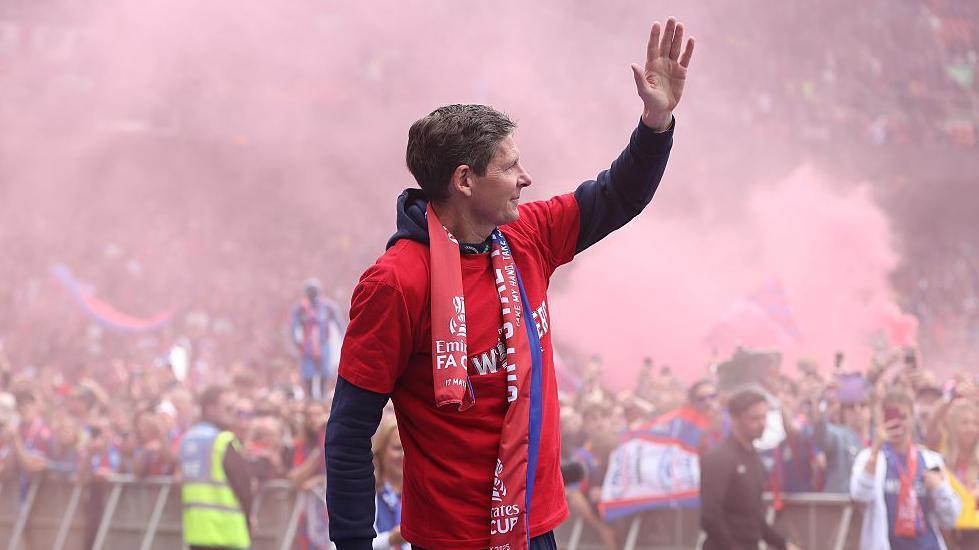 Oliver Glasner celebrates at a Crystal Palace parade