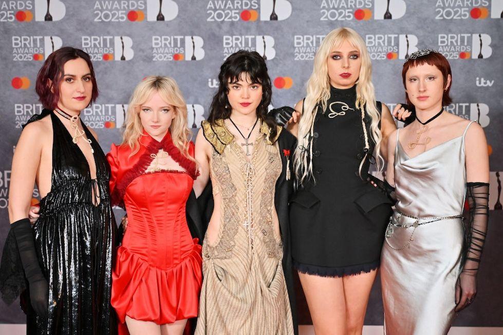 Aurora Nishevci, Emily Roberts, Abigail Morris, Georgia Davies and Lizzie Mayland of The Last Dinner Party arrive at The BRIT Awards 2025.