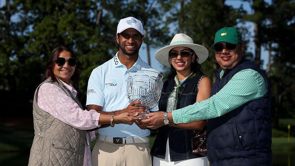 Aaron Rai and his family celebrate winning the Par 3 Contest at the 2026 Masters 