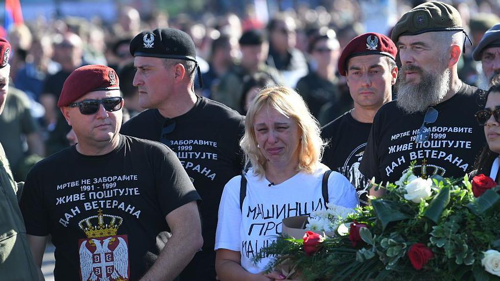 Families of those who died at Novi Sad laid flowers at the train station