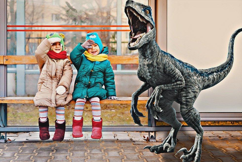 Children-and-a-dinosaur-wait-at-a-bus-stop.