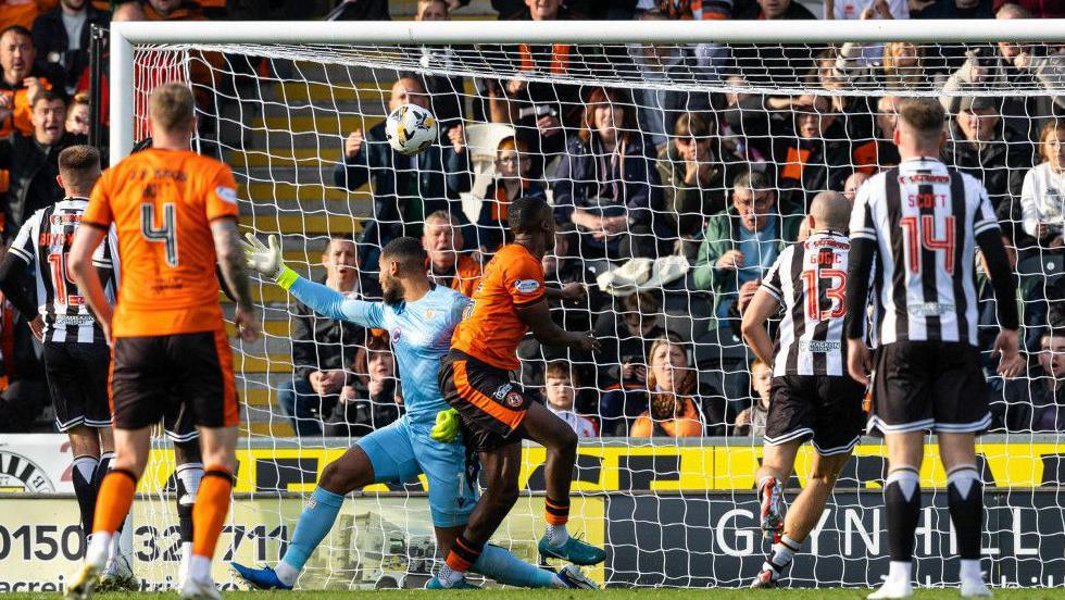 Dundee United's Emmanuel Adegboyega scores to make it 1-0 during a William Hill Championship match between St Mirren and Dundee United at the SMiSA Stadium