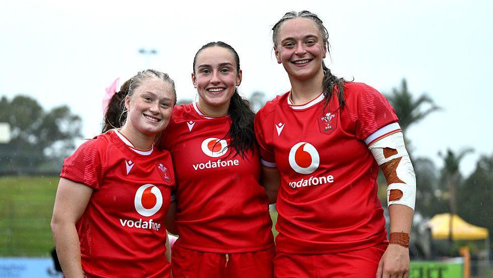Seren Lockwood, Nel Metcalfe and Tilly Vucaj celebrate after the match 