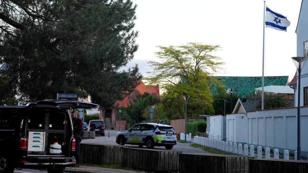 A police vehicle is seen as police officers investigate two blasts near the Israeli embassy in Copenhagen, Denmark, October 2, 2024