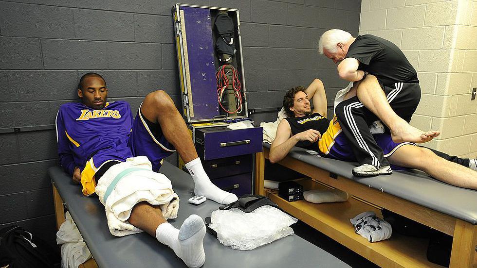Kobe Bryant and Pau Gasol on the treatment tables with Alex McKechnie overseeing