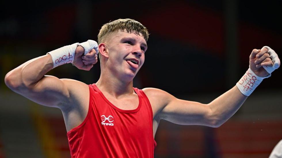Owain Harris-Allan celebrates winning a bout