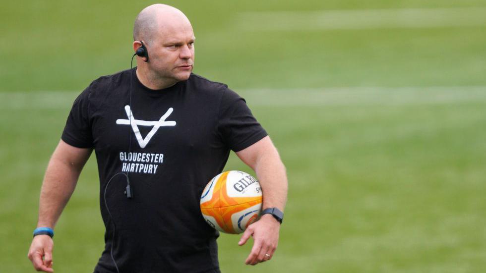 Gloucester-Hartpury head coach Sean Lynn watches on during training