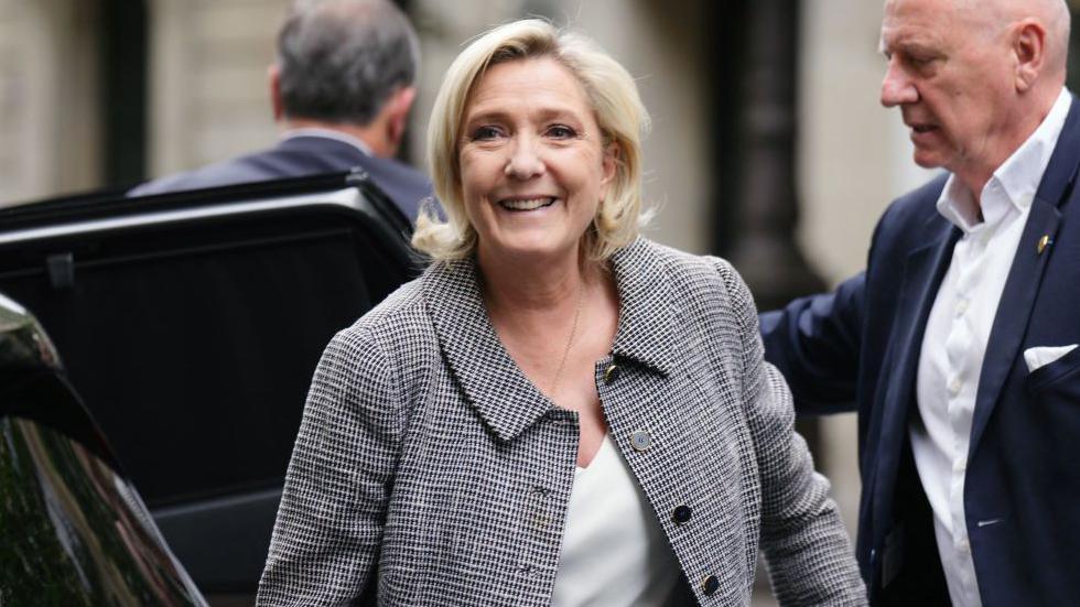 French Rassemblement National (RN) far-right party's leader Marine Le Pen arrives at the far-right Rassemblement National (RN) party headquarters in Paris on July 8