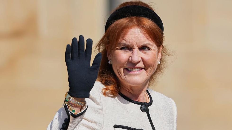 Sarah Ferguson waves as she attends the Easter Matins Service at St. George's Chapel, Windsor Castle on April 20, 2025 in Windsor, England