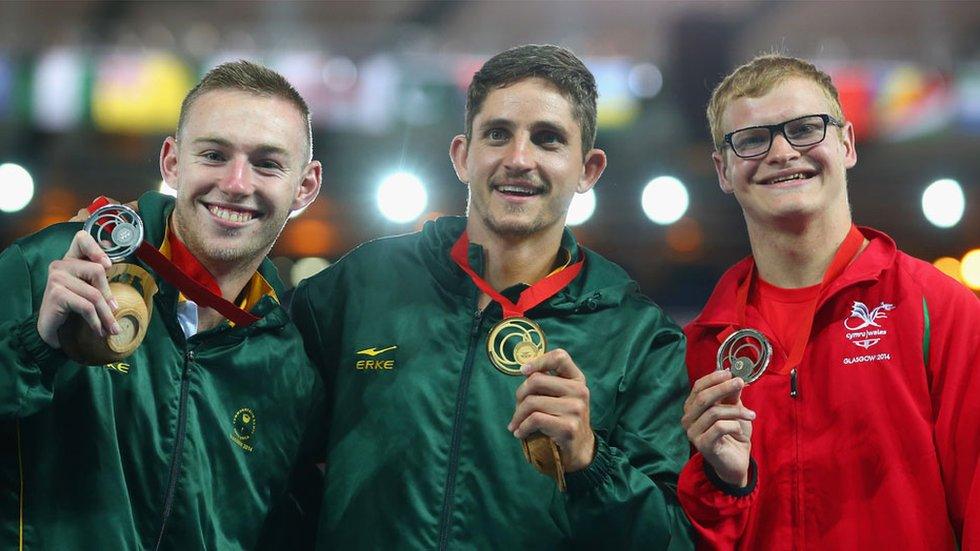 Rhys Williams shows off his bronze medal with Charl De Toit (silver) and Fanie Van Der Merwe (gold).