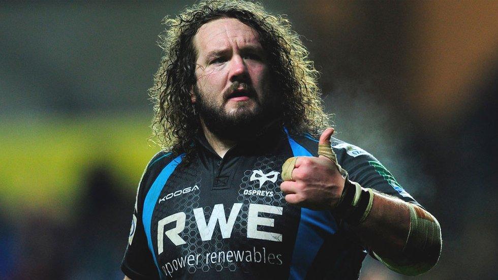 Adam Jones gives the thumbs up during an appearance for Ospreys