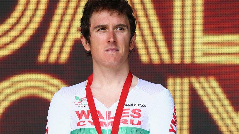 Geraint Thomas on the rostrum after being presented with his Commonwealth Games bronze medal