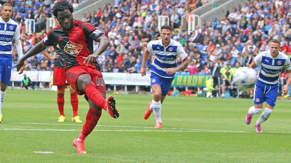 Wilfried Bony fires a penalty against the bar for Swansea City at Reading