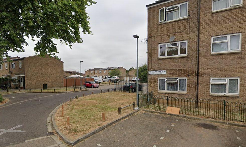 Part of an '80s council estate showing Allexton Gardens sign