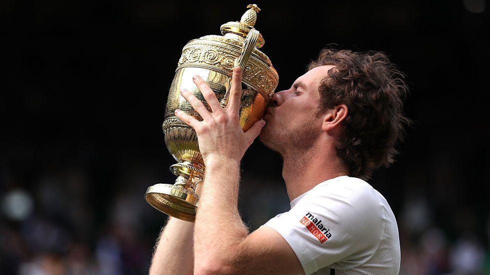 Andy Murray kisses Wimbledon trophy