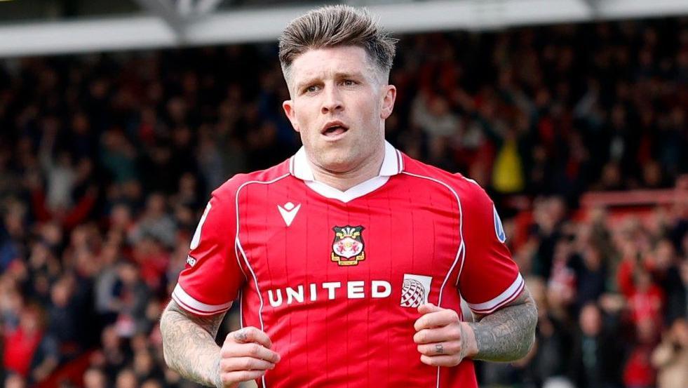Wrexham's Josh Windass celebrates