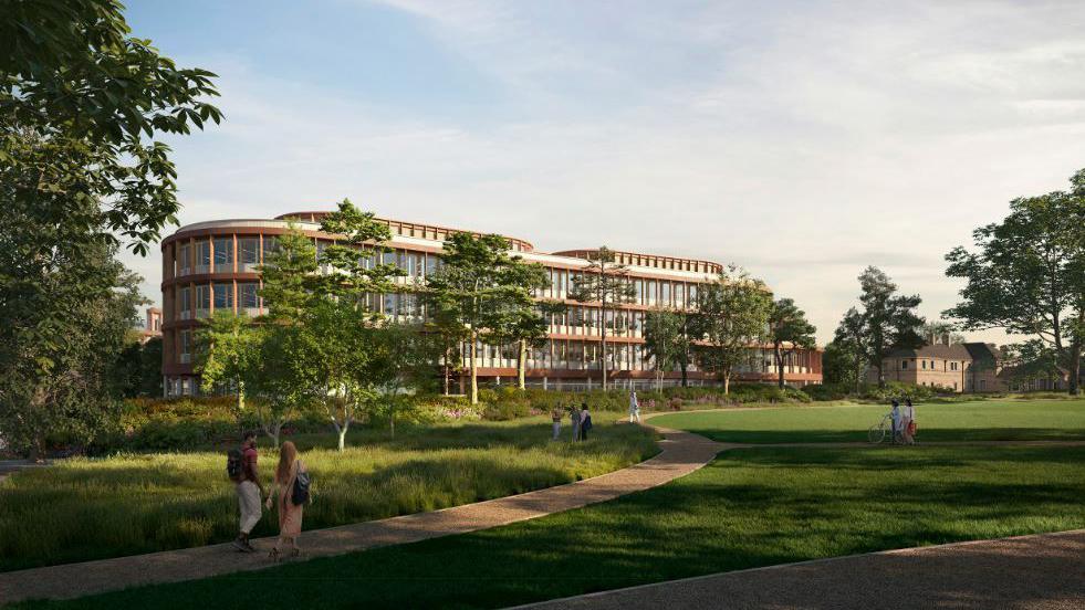 An architects image of a large brown and white science research building sitting behind large green spaces with tree-lined paths. The building is three stories high and curved at each end, vaguely resembling a cruise ship like structure