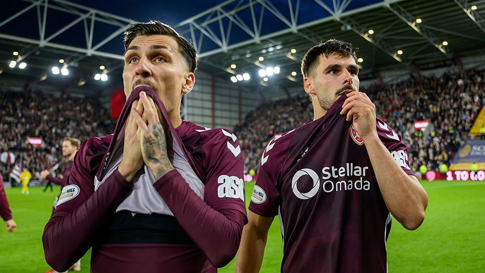 Alexandros Kyziridis and Claudio Braga