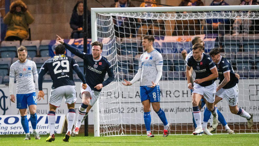 Dundee's Jordan McGhee celebrates after scoring to make it 2-2 during a William Hill Premiership match between Dundee and Kilmarnock at the Scot Foam Stadium at Dens Park