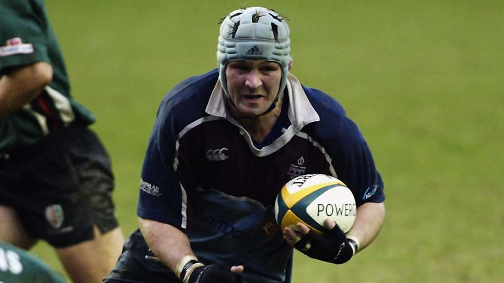 Neil Spence playing holding a ball while playing rugby for Rotherham in 2003