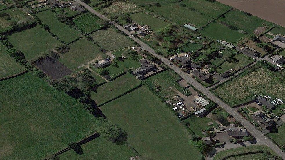 An aerial view of the agricultural land of the proposed site