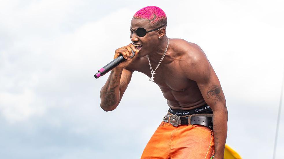 Ruger performs onstage during day 2 of the Afro Nation Detroit 2024 Festival at Bedrock's Douglass Site on August 18, 2024 in Detroit