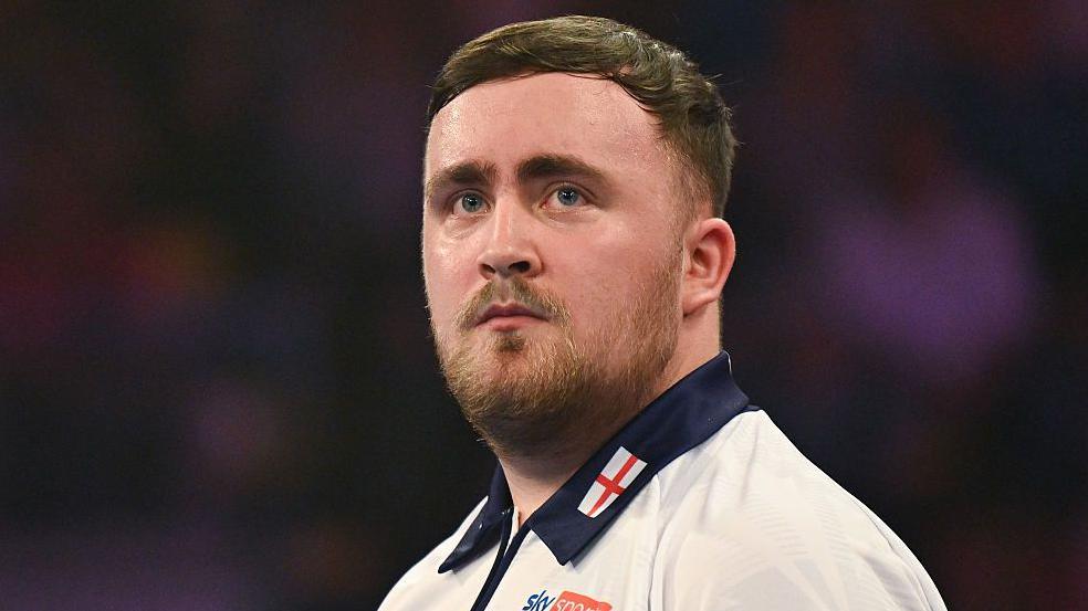 Luke Littler looks dejected during the game in Frankfurt