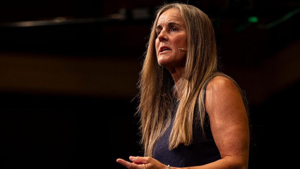 Brandi Chastain gives a speech at the 2025 FAW National Coaching Conference