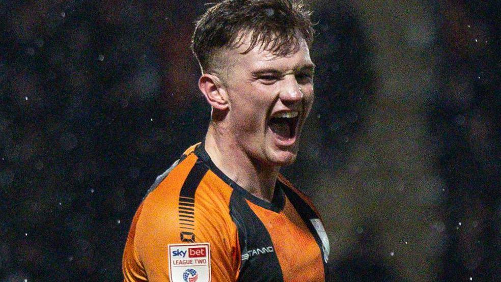 Mark Shelton celebrates a goal for Barnet