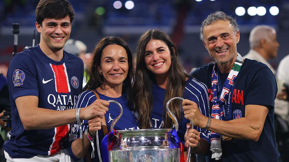 Luis Enrique joins his wife Elena Cullell and children after PSG's Champions League win against Inter Milan in Munich