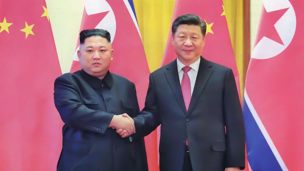 Kim Jong un and Xi Jinping