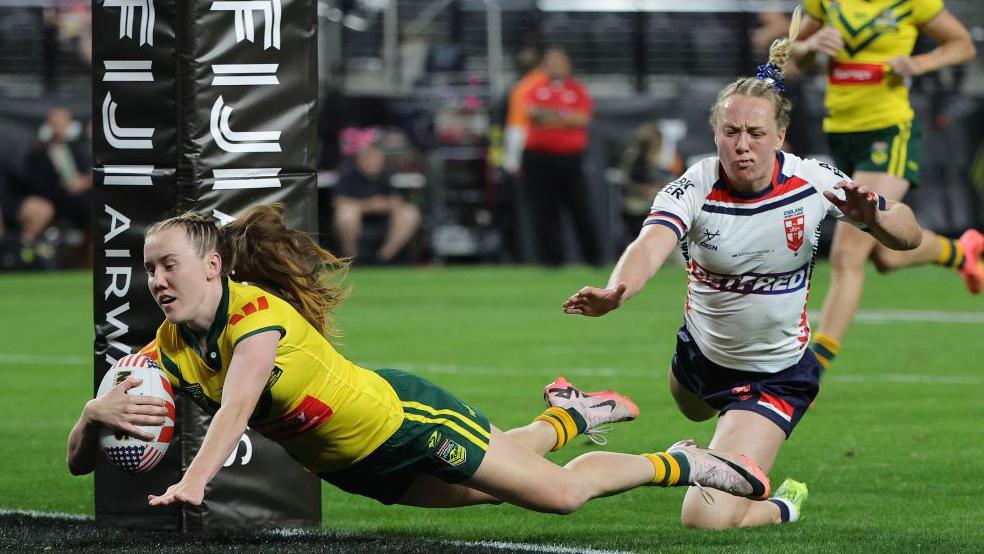 Australia's Tamika Upton scores a try against England