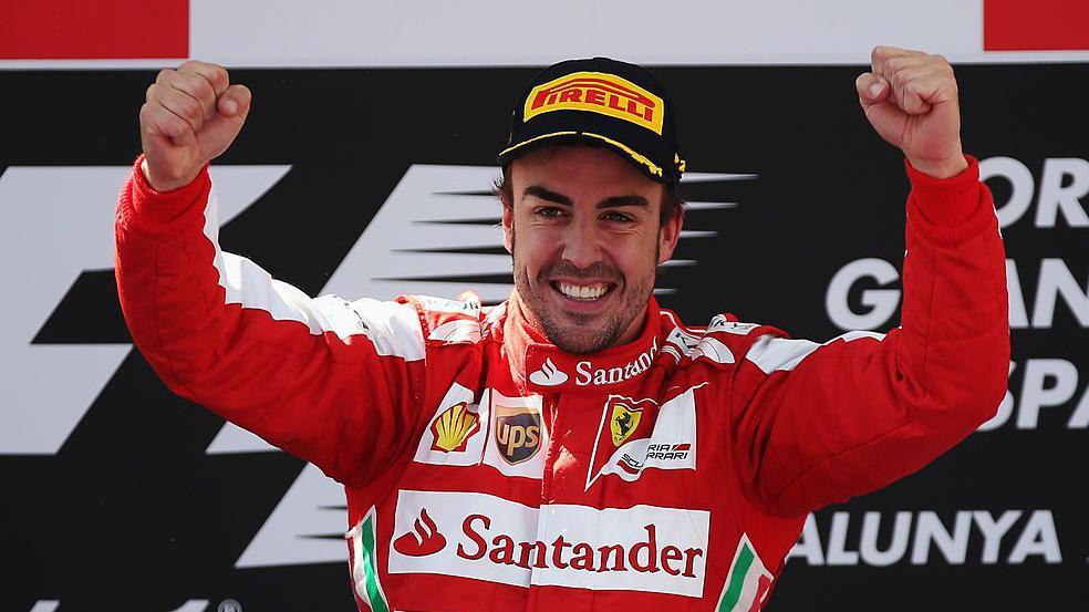 Fernando Alonso celebrates winning the 2013 Spanish Grand Prix