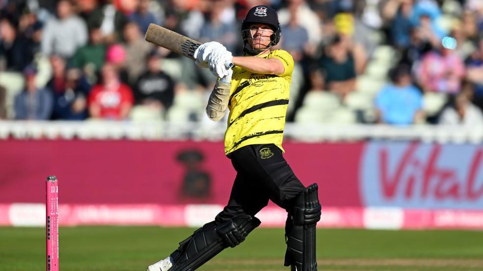 James Bracey hits a shot for Gloucestershire