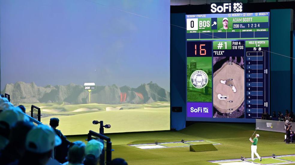 A representation of indoor TGL golf with a player hitting a shot at a simulator screen