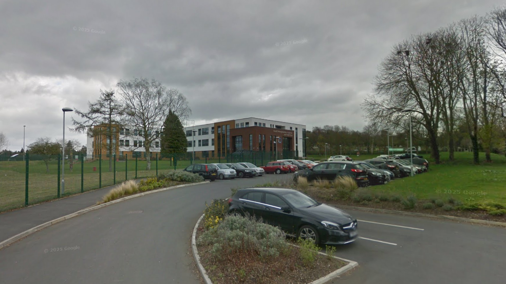 South Nottinghamshire Academy, a red brick and white render multi-storey secondary school