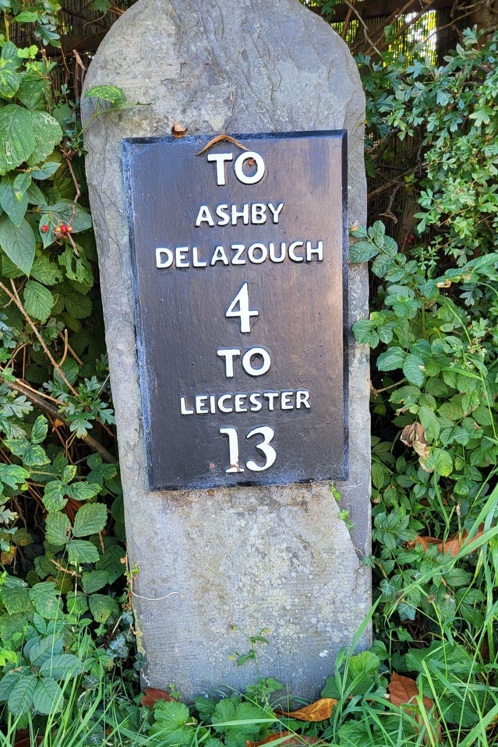 A stone and metal marker in Leicestershire