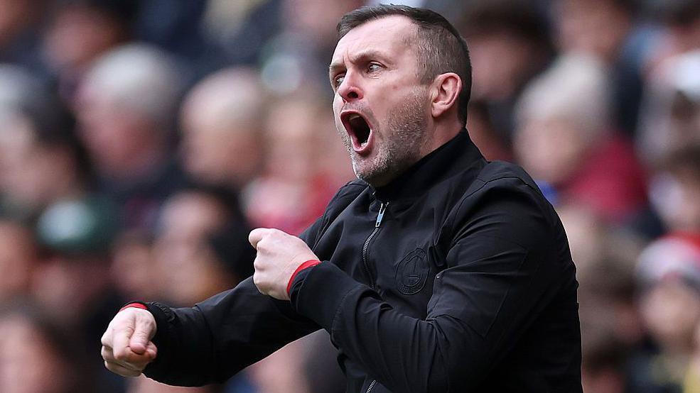Nathan Jones gesticulates to his Charlton Athletic players from the touchline
