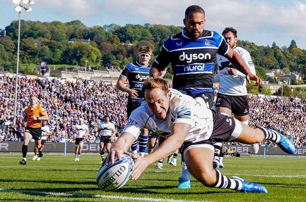 Bristol's Max Malins dives over the line to score a try in the Premiership derby v Bath at the Rec