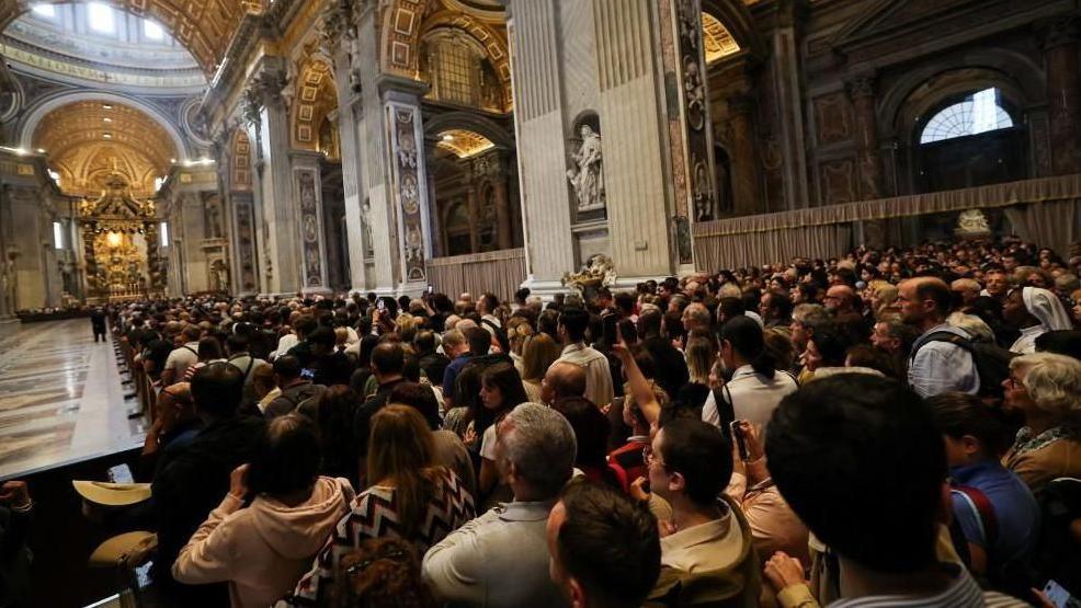Hundreds of mourners queue to see the Pope's body inside St Peter's Basilica on Wednesday 23 April.