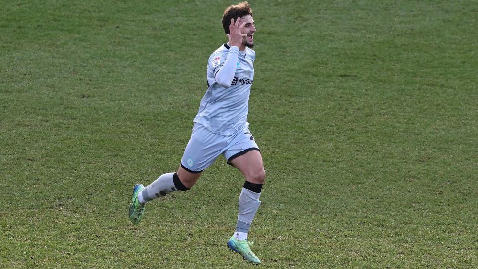 Millwall striker Mihailo Ivanovic celebrates after scoring against Luton Town