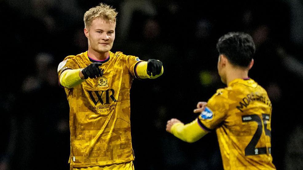 Andri Gudjohnsen of Blackburn Rovers celebrates with Ryoya Morishita of Blackburn Rovers after scoring his team's second goal during the Sky Bet Championship match against Preston North End at Deepdale