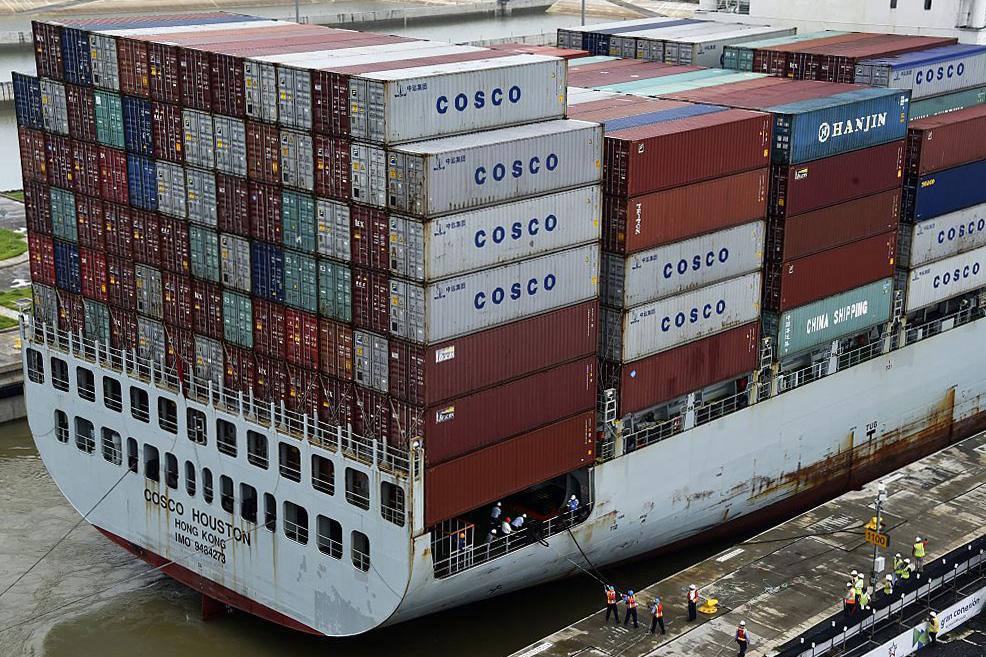 The cargo ship Cosco Houston crosses the new Cocoli Locks during a test at the Panama Canal on June 23, 2016.