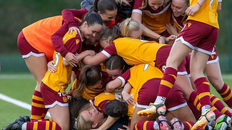 Motherwell players pile on 